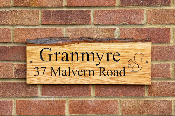 House sign and plaques